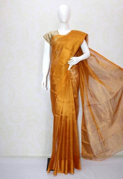 golden tissue saree with contrast blouse